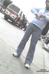 Tight pants show a Latina's big cameltoe